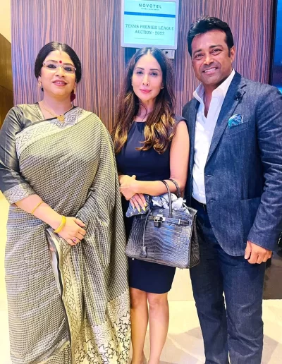 1. Dr. Sohini Sastri with Indian former tennis player Leander Paes and Actress Kim Sharma at the auction event of the Tennis Premier League.
