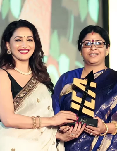2. Dr. Sohini Sastri with Indian actress Madhuri Dixit at the IEA Award ceremony.