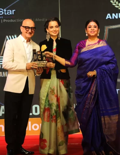 6. Dr. Sohini Sastri with Indian actor, director & producer Anupam Kher and Indian actress & filmmaker Kangana Ranaut at the IGA Award ceremony.
